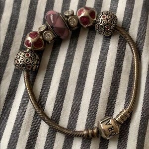 Pandora Bracelet with silver and purple charms